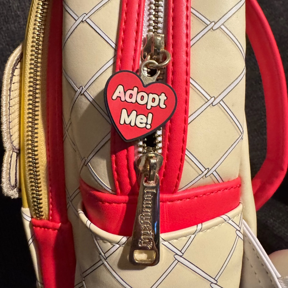 Loungefly Pound Puppies Yellow and Cream Backpack - Picture 6 of 11